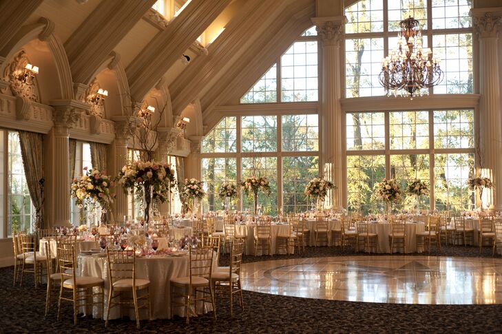 The reception focus was monochromatic sticking with greens, whites and ivories throughout centerpieces which varied at 3 different heights.  The tables consisted of an ivory sparkle table cloth and eggplant accents within the china.