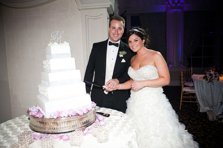Bride and Groom Cutting the Cake