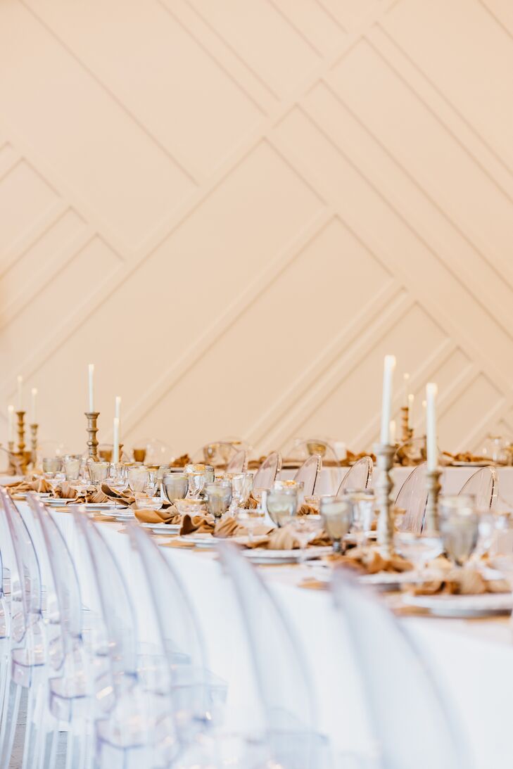 Boho Reception Decor With Ghost Chairs and Taper Candles