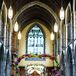 Lush Blooms and Greenery on Archway