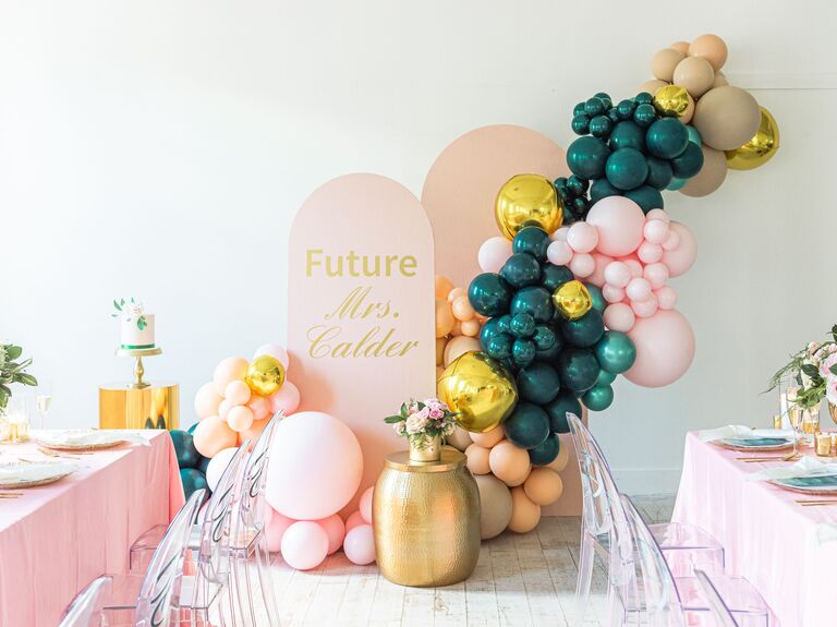 Teal-and-pink balloon installation 