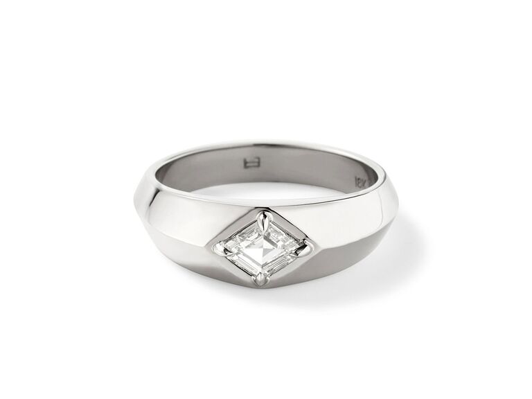 white metal signet ring with rhombus shaped diamond