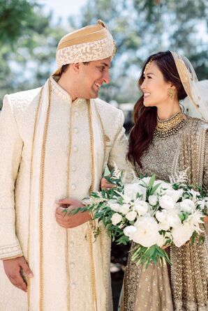 Couple in Traditional Gold Hindu Wedding Attire