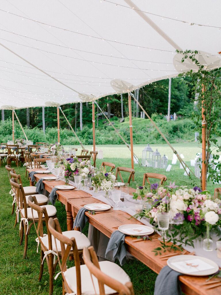 Outdoor summer wedding tent with string lights 