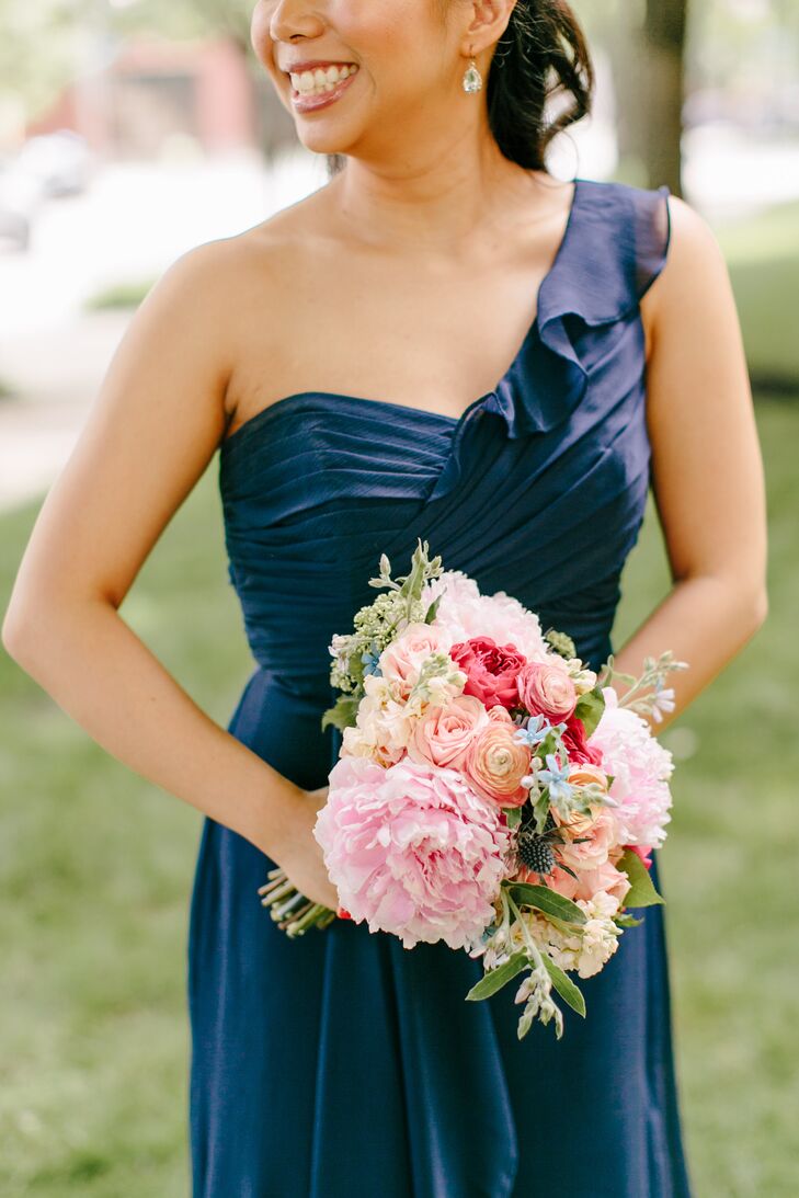 The bridesmaids chose any dress style they liked in the Marine color (a bright navy) from David’s Bridal. Length, fabric and style were up to them. They selected any silver shoe style they liked and accessorized however they chose. “The goal was to help each woman look fabulous and feel comfortable the day of the wedding,” Mary says.