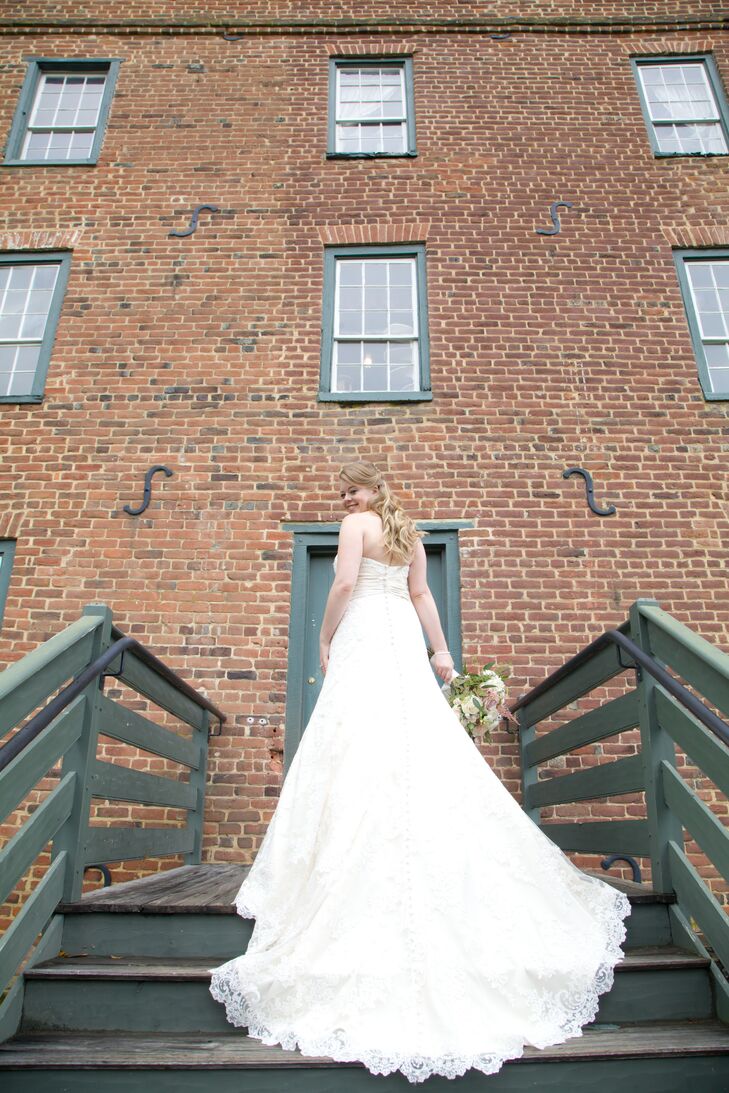 Jennie wore a strapless, A-line Allure Romance gown in ivory lace that featured beading in the bodice and a sweetheart neckline.