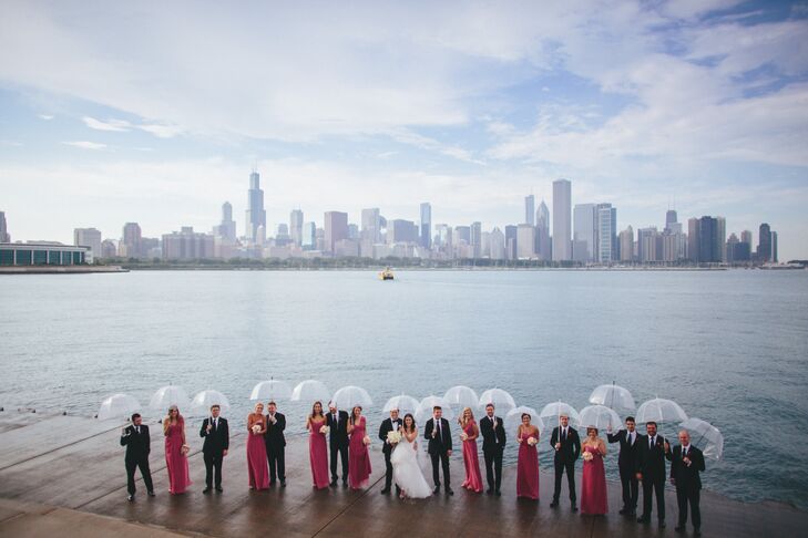 Despite an impromptu rain shower, the couple and their wedding party completed their first look and photo shoot prior to the start of the ceremony. "We didn't want to miss any of the party!" Liz explains.