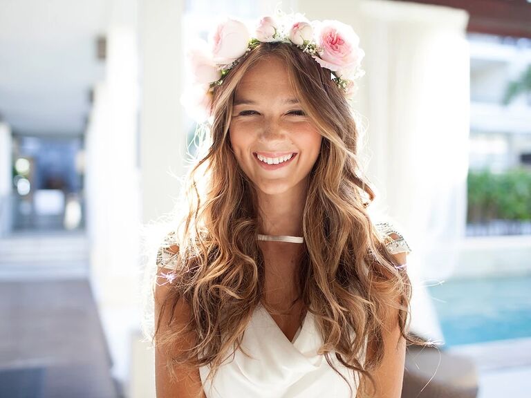 Bride wears her hair long and loose on her wedding day. 