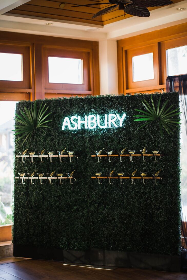 Modern Greenery Wall with Cocktails and Lit Sign