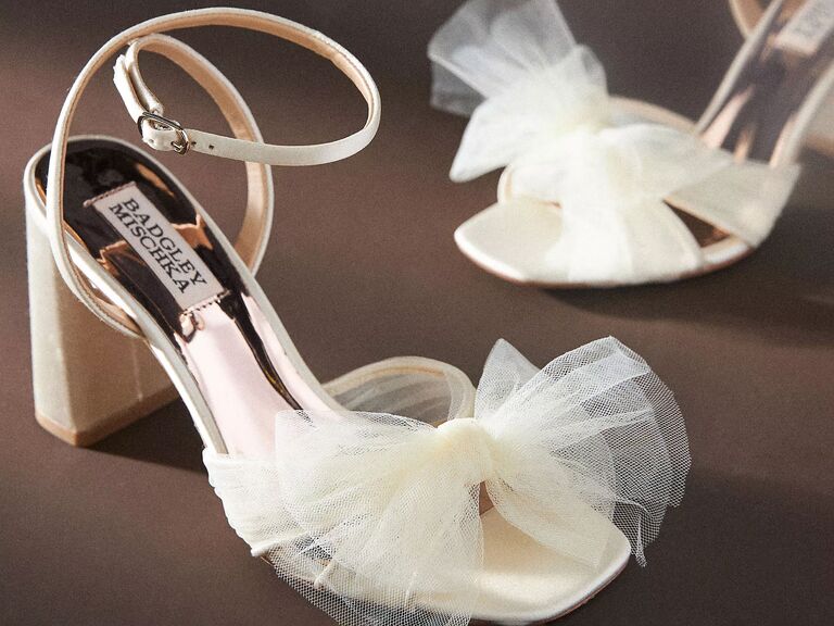 Badgley Mischka best shoes for the bride with slim block heel and tulle bow