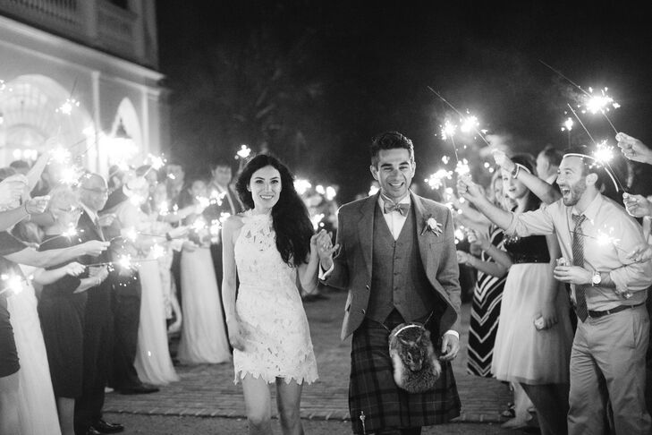 Before the sparkler exit, Nina changed into a beautiful white getaway dress by Free People. "I loved how it looked with my something blue Prada heels," she says. Since the couple live in London, England, they had a London black cab whisk them away at the end of the night.