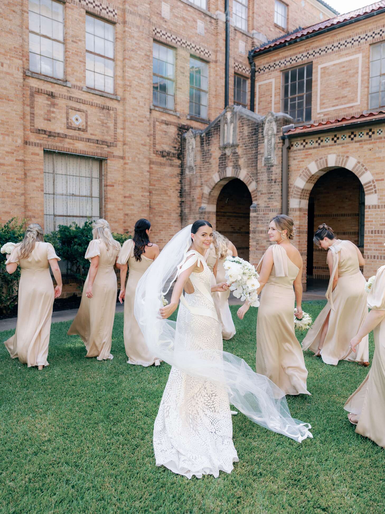 church wedding dress for bridesmaid Bride in Long Veil With Bridesmaids in Taupe Colored Gowns at Grounds Formal dress