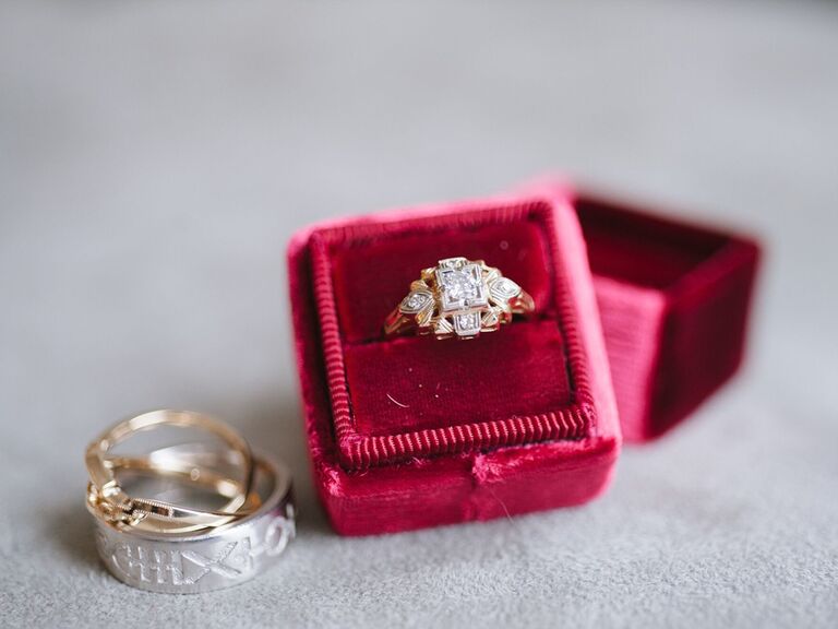 Vintage art deco engagement ring in box with wedding bands