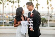 Karen and Ly tied the knot with a beachfront microwedding in Laguna Beach, <a href="https://www.theknot.com/content/california-wedding-planning-tips" 