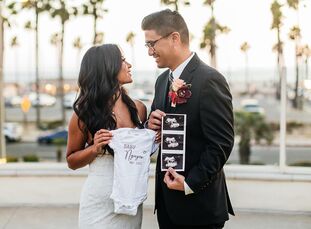 Karen and Ly tied the knot with a beachfront microwedding in Laguna Beach, <a href="https://www.theknot.com/content/california-wedding-planning-tips" 
