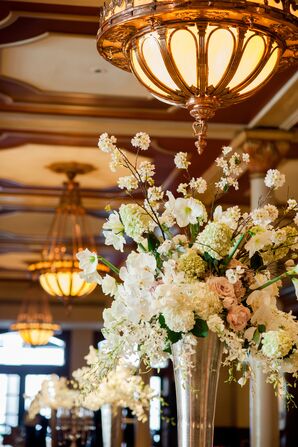 Pale Floral Arrangement of Amaryllis, Roses and Orchids