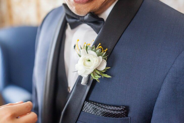 White Ranunculus and Succulent Boutonniere