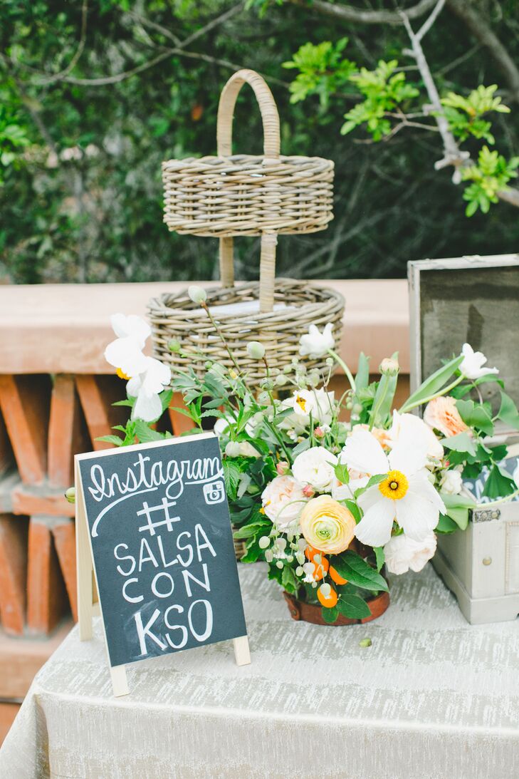 Handwritten chalkboard signs shared the day's official Instagram hashtag with guests.