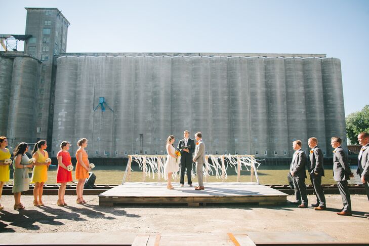 "We had a true 'Buffalo' style wedding—industrial chic style with Buffa-love everywhere!"says Bernice. The outdoor wedding ceremony took place alongside the Buffalo River surrounded by a cluster of incredible old grain elevators called "Silo City" which recently because an event venue. "They'd actually never had a wedding there, but we knew we had to be the first!" she adds.