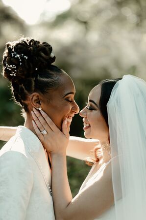 Brides Embracing and Smiling