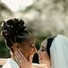 Brides Embracing and Smiling