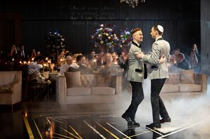 Two Grooms in Black and Gray Tuxedos Share Their First Dance on Dance Floor With Custom Monogram, Jewish Wedding Reception