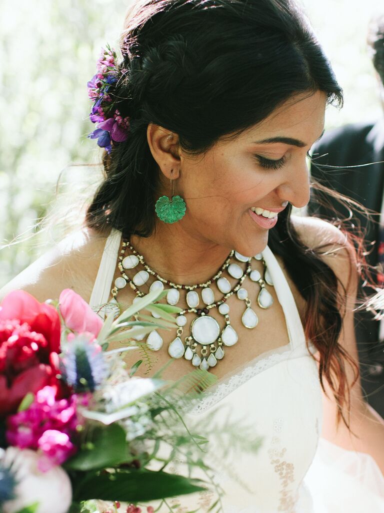 wedding hair flowers braided half up with purple florals