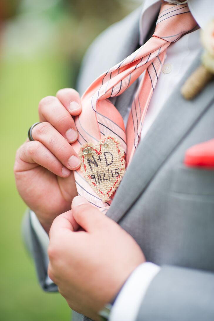 As a gift to her husband-to-be, Danielle made a special fabric heart with the couple's wedding date and initials and sewed it onto the back of Nicholas's tie.