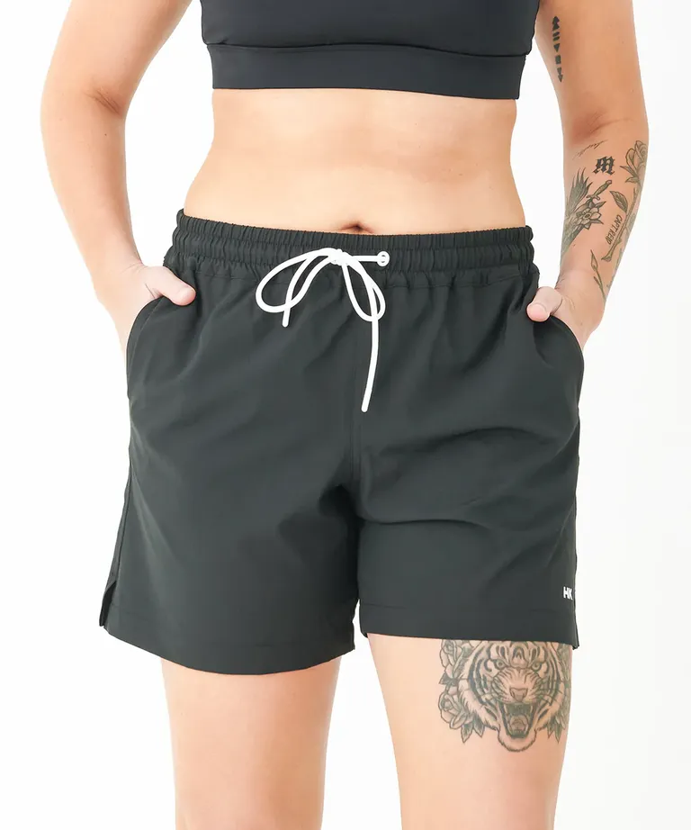 classic black swim shorts with white tie