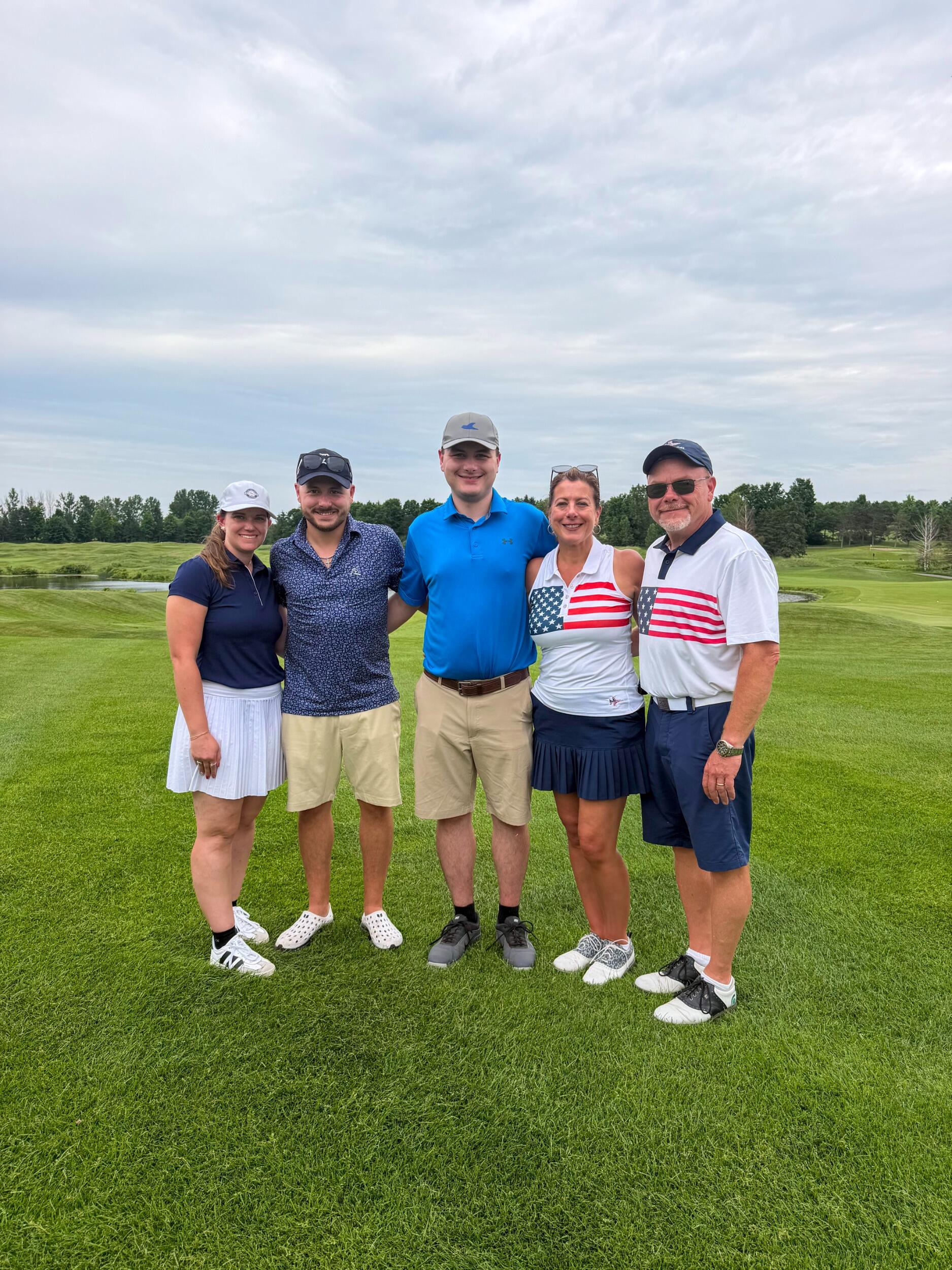 Golfing in Northern Michigan.  We're building some serious chemistry so watch out, because we're going to be a dangerous scramble duo before long!
