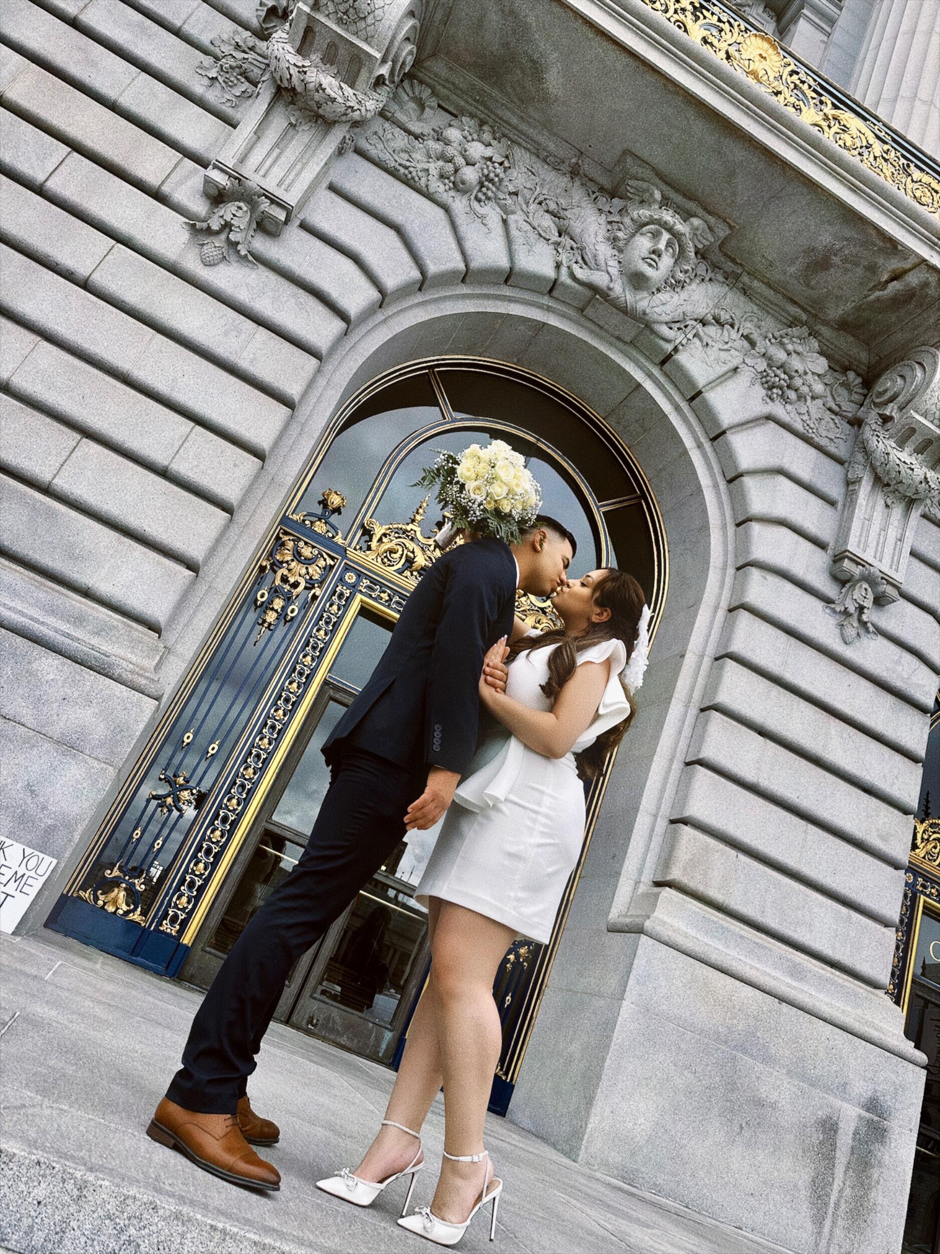 On a Valentine’s Day they’ll never forget, Anna and Alberto said “I do” at the stunning San Francisco City Hall. With love in the air and Cupid clearly on duty, the two made it official in the most romantic way possible.

But for them, this wasn’t the grand finale. It was just one check off the list. The true celebration—the one that holds deep meaning in their hearts, is their upcoming Catholic wedding.

They can’t wait to stand before God, surrounded by loved ones, and honor the sacrament of marriage in the most sacred and beautiful way… in Mexico.                                     -                                                                                            

En un Día de San Valentín que jamás olvidarán, Anna y Alberto se dieron el “sí, acepto” en el majestuoso Ayuntamiento de San Francisco. Con el amor en el aire y Cupido claramente haciendo de las suyas, sellaron su unión de la manera más romántica posible.
Pero para ellos, ese no fue el gran final… fue solo una marca más en el camino. La verdadera celebración —la que guarda un significado profundo en sus corazones— está aún por venir. Su boda católica, donde se unirán ante Dios, rodeados de sus seres queridos, para consagrar su amor de la forma más sagrada y hermosa… en México.