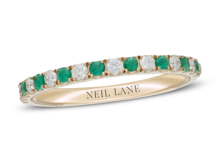 Alternating diamond and emerald gold engagement band. 