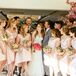 For their wedding party, Kate and Jordan went for a classic aesthetic with a subtle midcentury edge. Jordan’s groomsmen donned traditional Jack Silver suits in dark gray, while the bridesmaids wore tea-length Lela Rose dresses with V-shaped bateau necklines and asymmetric hems.
