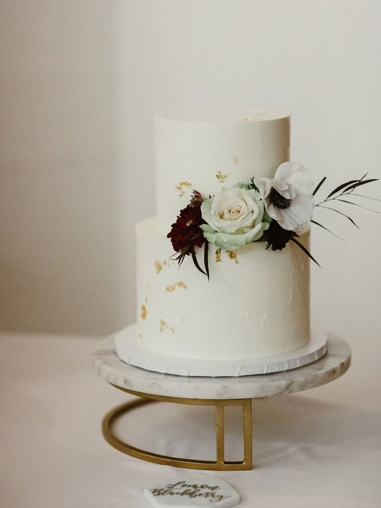 simple cake on marble-and-gold cake stand