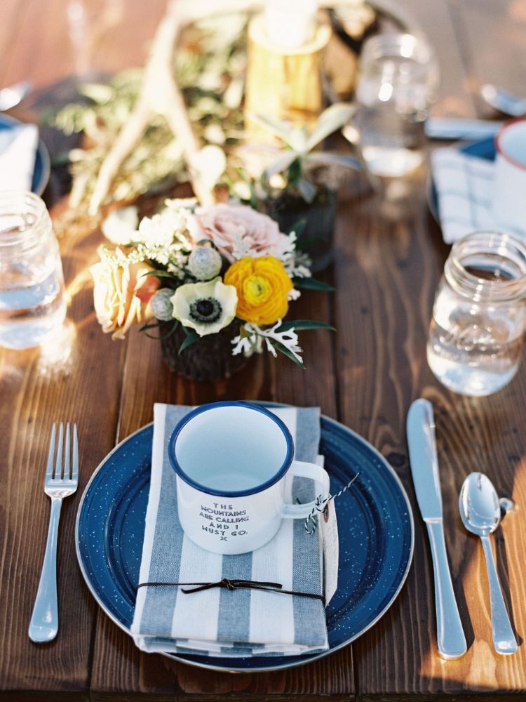 rustic place setting with enamel dishes