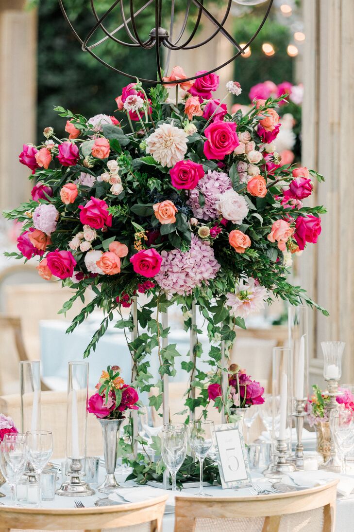 Tall, Jewel-Tone Floral Centerpiece With Ink and Fuchsia Flowers at Estate Reception