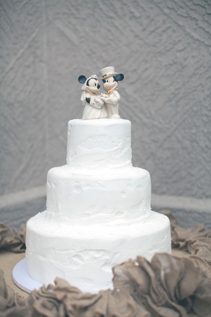 This vintage Mickey Mouse and Minnie Mouse wedding cake topper is more than just sweet nostalgia for Tessa and Kevin. While they were dating, the first trip they went on was to Disneyland, where they fell in love. “Since that trip, we have kind of made Disneyland our special place,” says Tessa. Of course, they had to include Mickey Mouse in their wedding!