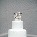This vintage Mickey Mouse and Minnie Mouse wedding cake topper is more than just sweet nostalgia for Tessa and Kevin. While they were dating, the first trip they went on was to Disneyland, where they fell in love. “Since that trip, we have kind of made Disneyland our special place,” says Tessa. Of course, they had to include Mickey Mouse in their wedding!