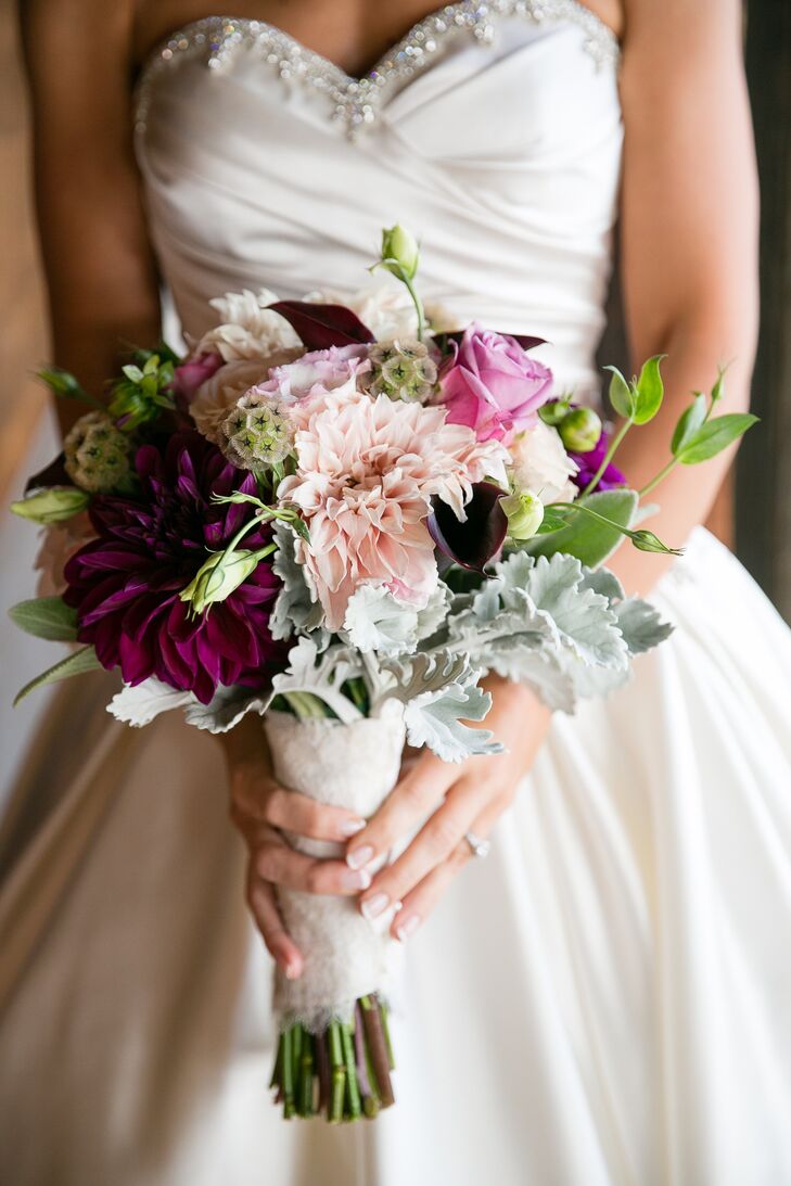 Kim's luxurious purple bouquet featured roses and large dahlia blooms.