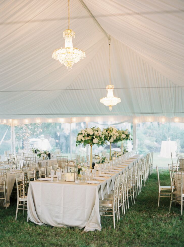 Chandeliers, lights, linens and floral centerpieces added a sophisticated feel to the tent's interior.