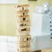 A fun alternative to the traditional guest book, the couple asked their guests to sign Jenga blocks that were laser cut with their wedding date.