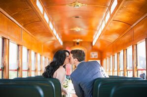Chi and Ryan Kissing on Wood Trolley