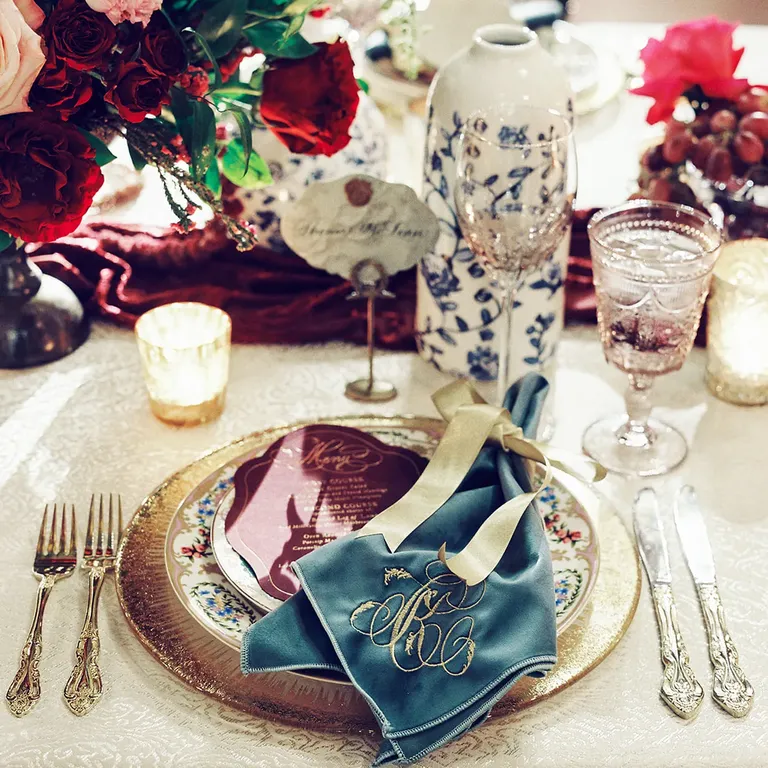 Royal Place Setting With Monogrammed Napkin, Gold Charger and Linen, China and Other Luxury Details