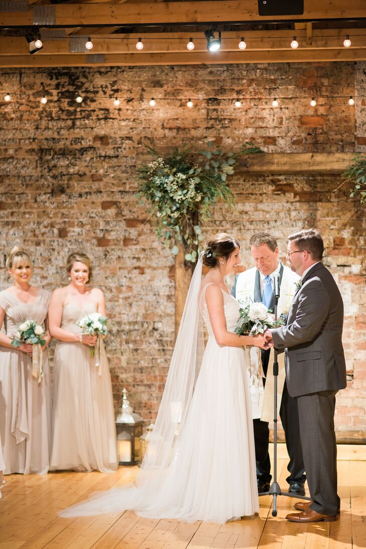 Alex created a trellis to serve as the backdrop during the ceremony, decorated in baby’s breath and greenery. Each side had an X that reflected the logo used on the stationery and decor.