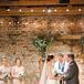 Alex created a trellis to serve as the backdrop during the ceremony, decorated in baby’s breath and greenery. Each side had an X that reflected the logo used on the stationery and decor.