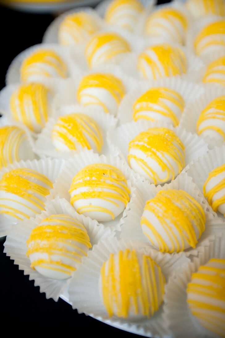 Sweetcheeks Desserts provided these bright cake pops for Dawn and Chad's colorful wedding.
