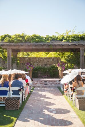 Wooden Pergola With Purple Flowers