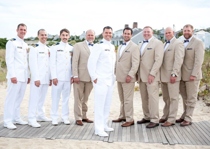 The groomsmen who were not in their military whites wore tan suits with navy bow ties and matching pocket squares.