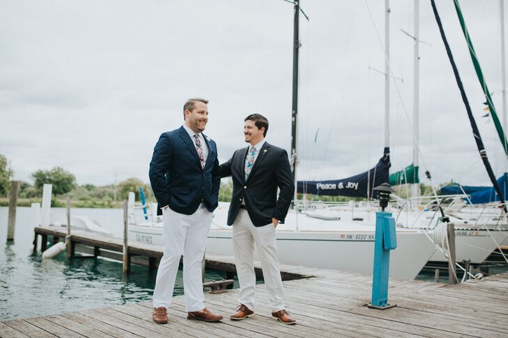 Justin wore a J.Crew navy suit jacket, a white shirt from Brooks Brothers, white chinos, and a floral tie from Sprezza; his best man followed a similar dress code.