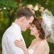 Katie topped off her vintage look with a birdcage-style veil, while Garret opted for a skinny black tie. "Garret and I both like a bit of a vintage look, which also matched well with our venue," Katie says.